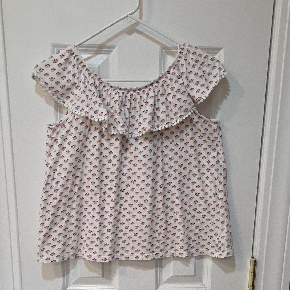 White Ruffled Sleeveless Blouse